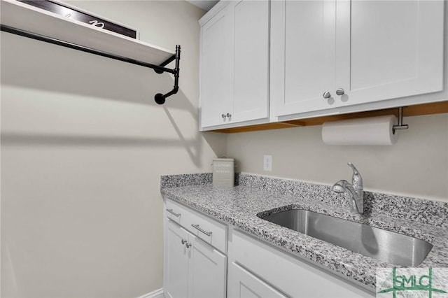 130 Canter Ct, Savannah, GA 31406 - clothes washing area with a sink