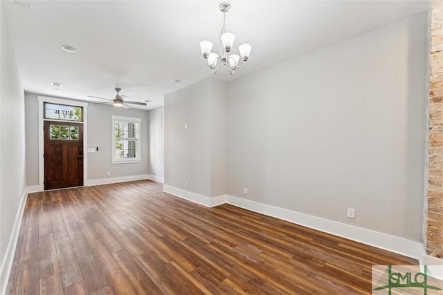 537 E Congress St, Savannah, GA 31401 - interior space with baseboards, ceiling fan with notable chandelier, and dark wood-type flooring
