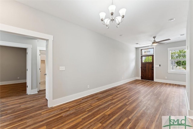 537 E Congress St, Savannah, GA 31401 - interior space with baseboards, ceiling fan with notable chandelier, and dark wood-type flooring