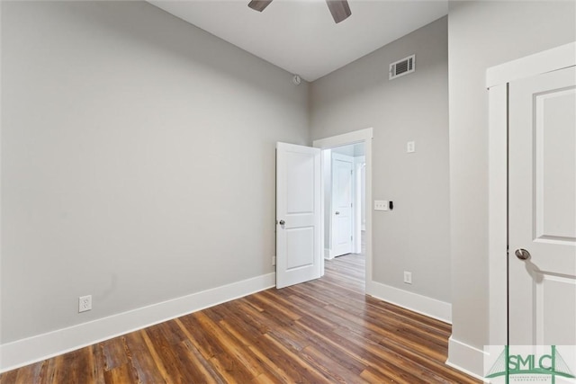 537 E Congress St, Savannah, GA 31401 - spare room featuring visible vents, baseboards, dark wood-style flooring, and ceiling fan