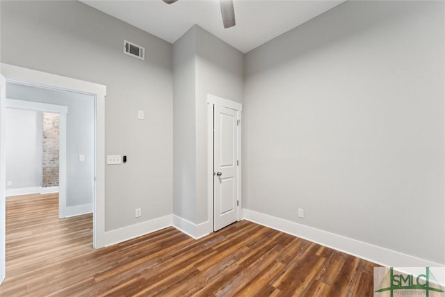 537 E Congress St, Savannah, GA 31401 - unfurnished room featuring baseboards, ceiling fan, wood finished floors, and visible vents