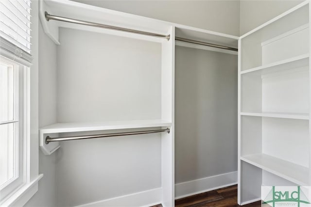 537 E Congress St, Savannah, GA 31401 - walk in closet with dark wood-style floors