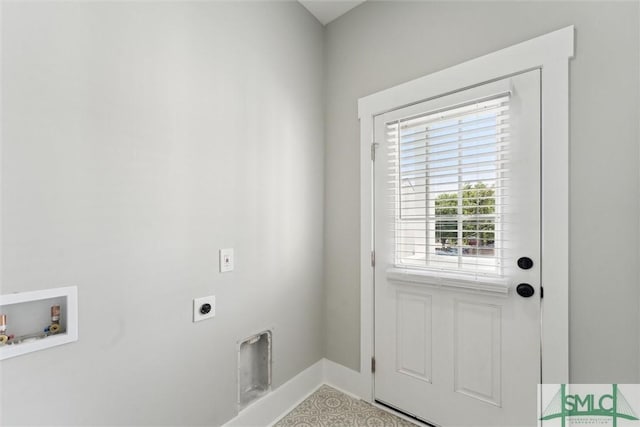 537 E Congress St, Savannah, GA 31401 - laundry room with electric dryer hookup, baseboards, laundry area, and hookup for a washing machine