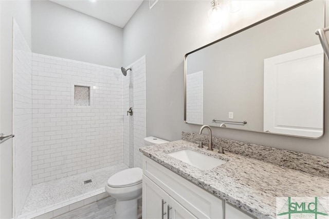 537 E Congress St, Savannah, GA 31401 - full bath with vanity, toilet, and a stall shower