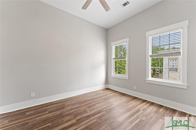 537 E Congress St, Savannah, GA 31401 - unfurnished room featuring visible vents, baseboards, ceiling fan, and wood finished floors