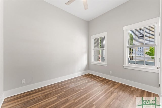 537 E Congress St, Savannah, GA 31401 - spare room with baseboards, ceiling fan, and wood finished floors