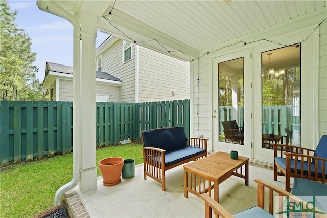 view of patio / terrace with a fenced backyard and outdoor lounge area