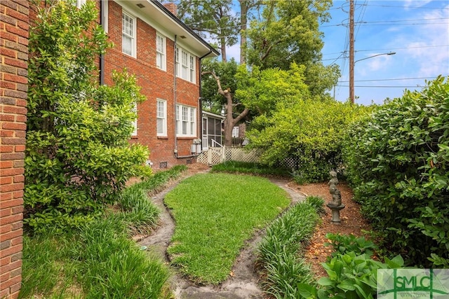 view of yard with fence