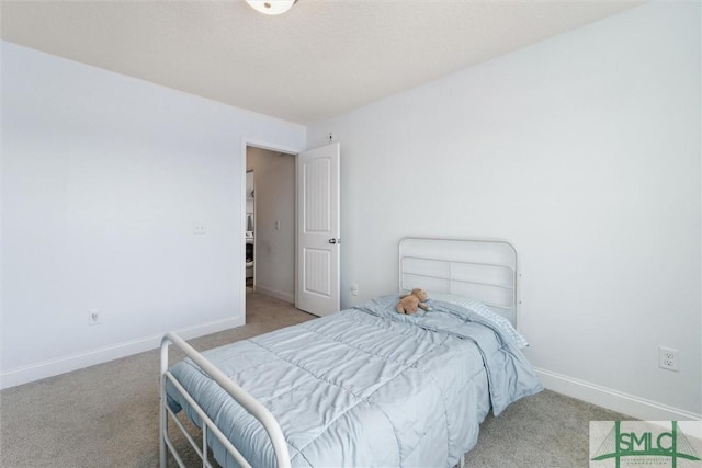 4 Rimes Ave SE, Ludowici, GA 31316 - carpeted bedroom featuring baseboards
