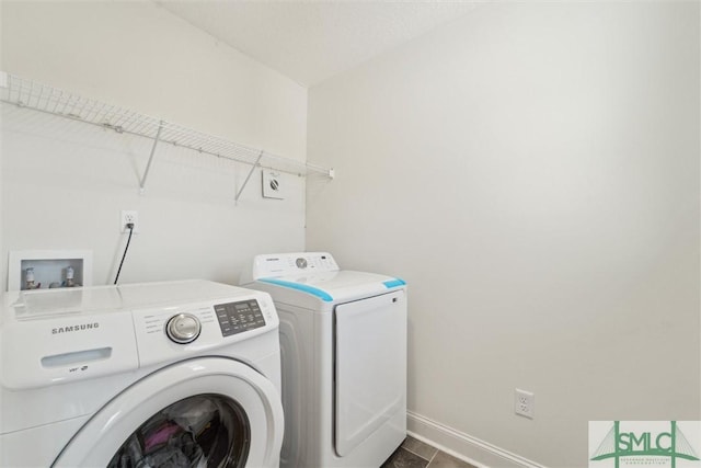 4 Rimes Ave SE, Ludowici, GA 31316 - laundry room featuring laundry area, washer and clothes dryer, and baseboards