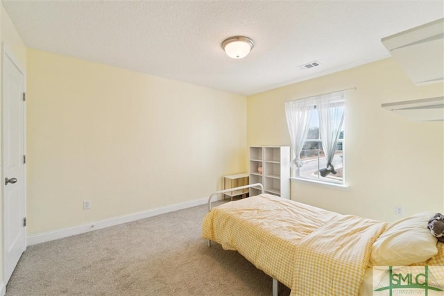4 Rimes Ave SE, Ludowici, GA 31316 - bedroom featuring carpet floors, baseboards, and visible vents