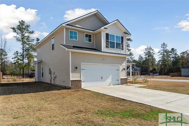 4 Rimes Ave SE, Ludowici, GA 31316 - view of side of home with an attached garage, a yard, and driveway