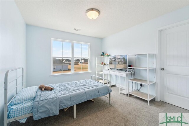 4 Rimes Ave SE, Ludowici, GA 31316 - carpeted bedroom with visible vents