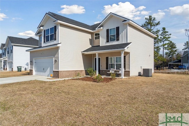 4 Rimes Ave SE, Ludowici, GA 31316 - view of front of property featuring a garage, a front lawn, cooling unit, a porch, and driveway