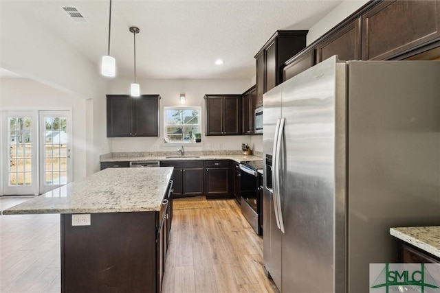 4 Rimes Ave SE, Ludowici, GA 31316 - kitchen featuring appliances with stainless steel finishes, a wealth of natural light, a sink, and visible vents