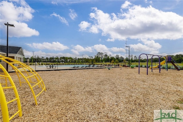 view of community featuring playground community