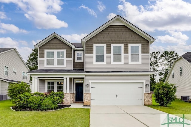 craftsman-style house featuring concrete driveway, a garage, a front lawn, and cooling unit