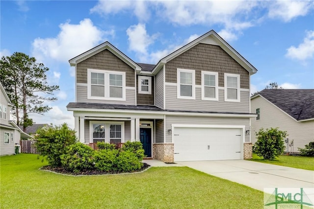 craftsman inspired home featuring a garage, concrete driveway, a front lawn, and brick siding