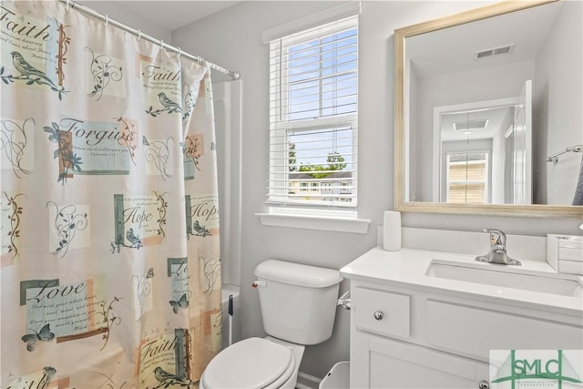 227 Flagler Dr, Savannah, GA 31419 - bathroom featuring vanity, a shower with curtain, toilet, and visible vents