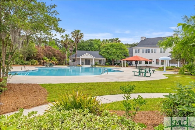 227 Flagler Dr, Savannah, GA 31419 - pool featuring an outbuilding, a patio area, and a yard