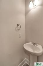 bathroom featuring baseboards