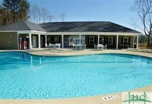 pool featuring a patio area