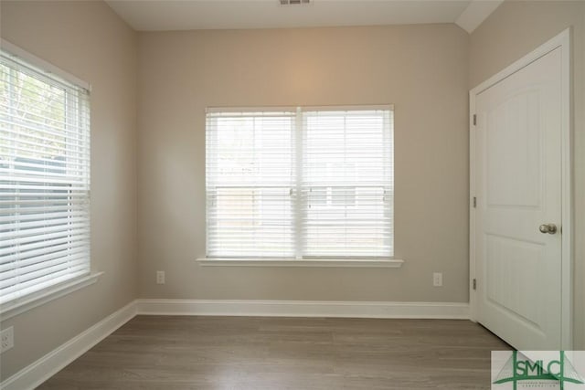 270 Kepler Loop, Richmond Hill, GA 31324 - unfurnished bedroom featuring wood finished floors and baseboards