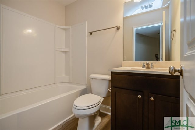 270 Kepler Loop, Richmond Hill, GA 31324 - bathroom with vanity, toilet, wood finished floors, and bathtub / shower combination