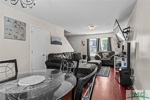 156 Laurel Green Ct, Savannah, GA 31419 - dining area with a textured ceiling and dark wood-type flooring