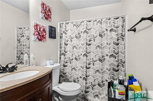 bathroom with vanity, a shower with curtain, and toilet