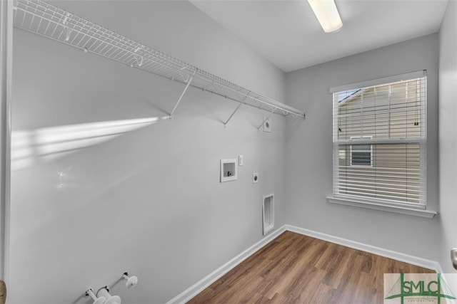 95 Wando View Way, Richmond Hill, GA 31324 - washroom featuring gas dryer hookup, hookup for an electric dryer, laundry area, wood finished floors, and hookup for a washing machine