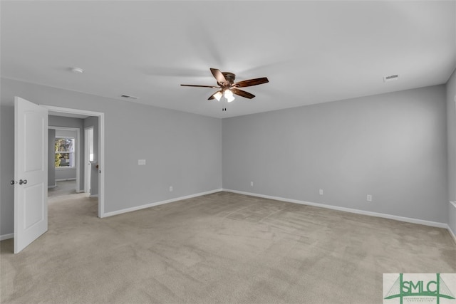 95 Wando View Way, Richmond Hill, GA 31324 - empty room with visible vents, baseboards, ceiling fan, and light carpet