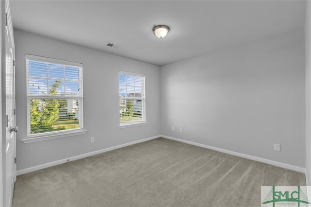 95 Wando View Way, Richmond Hill, GA 31324 - unfurnished room featuring visible vents, baseboards, and carpet floors