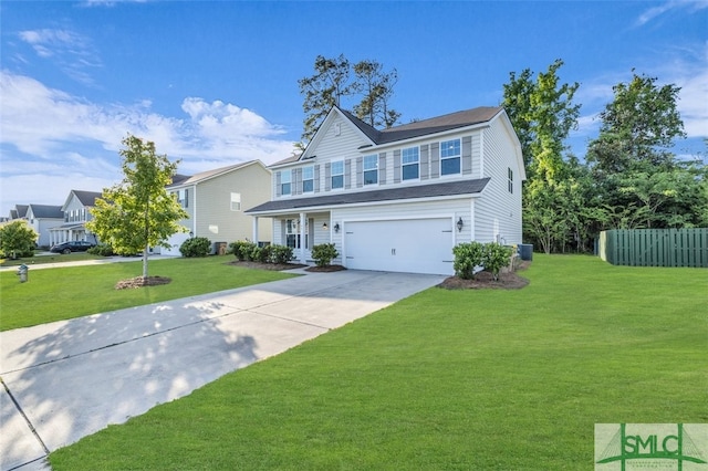 95 Wando View Way, Richmond Hill, GA 31324 - traditional home featuring a garage, fence, driveway, and a front yard