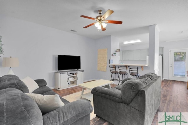 777 King George Blvd Unit 57, Savannah, GA 31419 - living room featuring wood finished floors, a ceiling fan, and baseboards