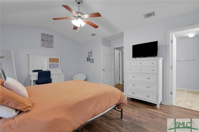 777 King George Blvd Unit 57, Savannah, GA 31419 - bedroom with vaulted ceiling, dark wood-style flooring, a ceiling fan, and baseboards
