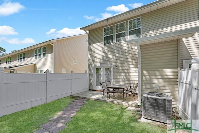 777 King George Blvd Unit 57, Savannah, GA 31419 - rear view of property featuring central AC unit and a patio