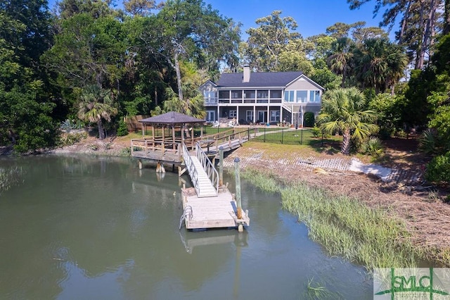 view of dock featuring a water view, a gazebo, and stairs