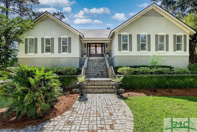 16 Modena Island Dr, Savannah, GA 31411 - ranch-style home with french doors and roof with shingles