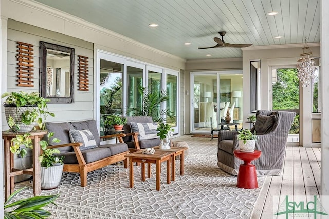16 Modena Island Dr, Savannah, GA 31411 - sunroom with crown molding, recessed lighting, wood finished floors, and a deck