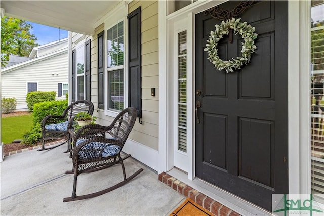 entrance to property with a porch