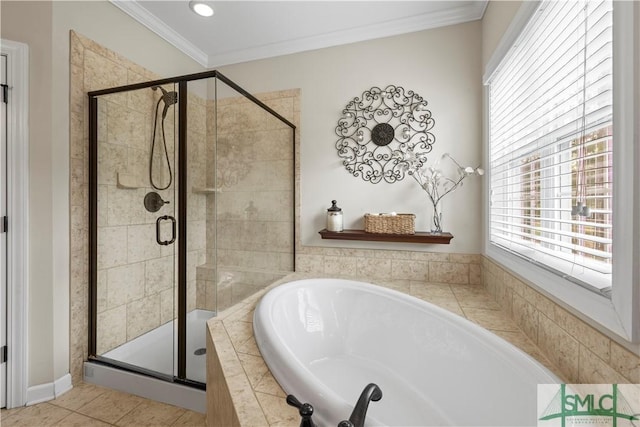 full bath with tile patterned flooring, ornamental molding, a garden tub, and a stall shower