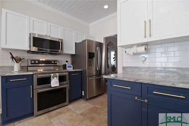 kitchen featuring appliances with stainless steel finishes, white cabinets, and blue cabinets