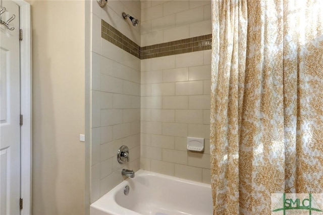 bathroom featuring shower / bathtub combination with curtain