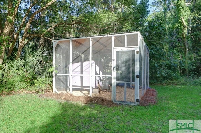 view of poultry coop with a yard