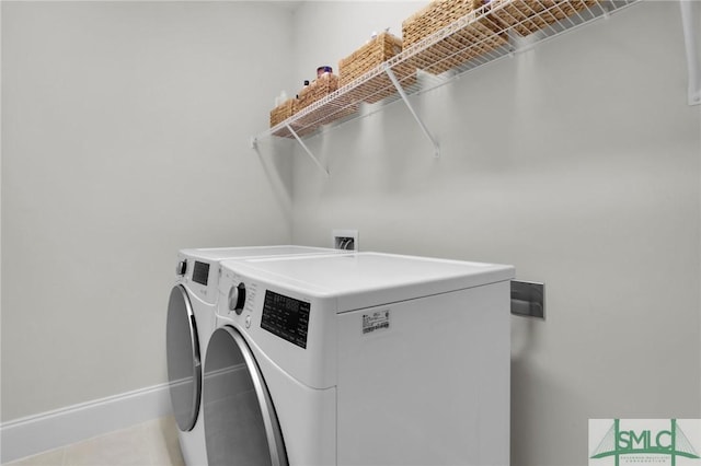631 Blue Moon Xing, Pooler, GA 31322 - washroom with baseboards, laundry area, and washing machine and dryer