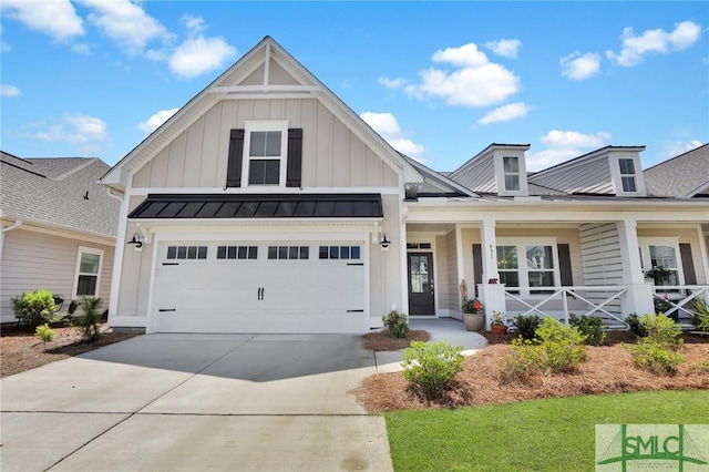 631 Blue Moon Xing, Pooler, GA 31322 - view of front of house featuring board and batten siding, a porch, a standing seam roof, driveway, and metal roof