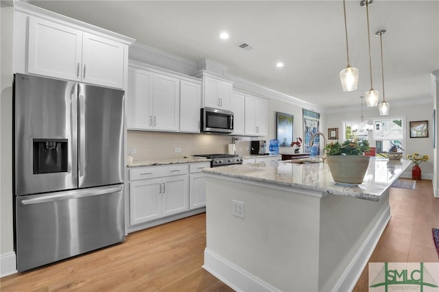631 Blue Moon Xing, Pooler, GA 31322 - kitchen featuring a sink, ornamental molding, stainless steel appliances, and white cabinets