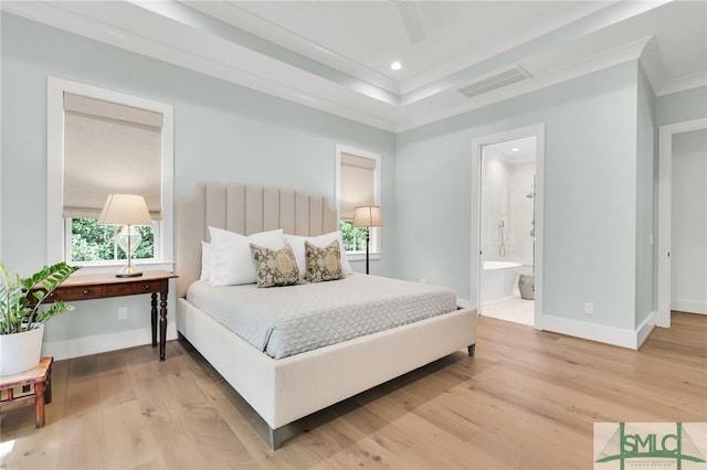 bedroom with visible vents, recessed lighting, wood finished floors, and multiple windows
