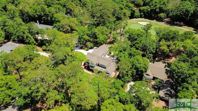 aerial view featuring view of golf course and a residential view
